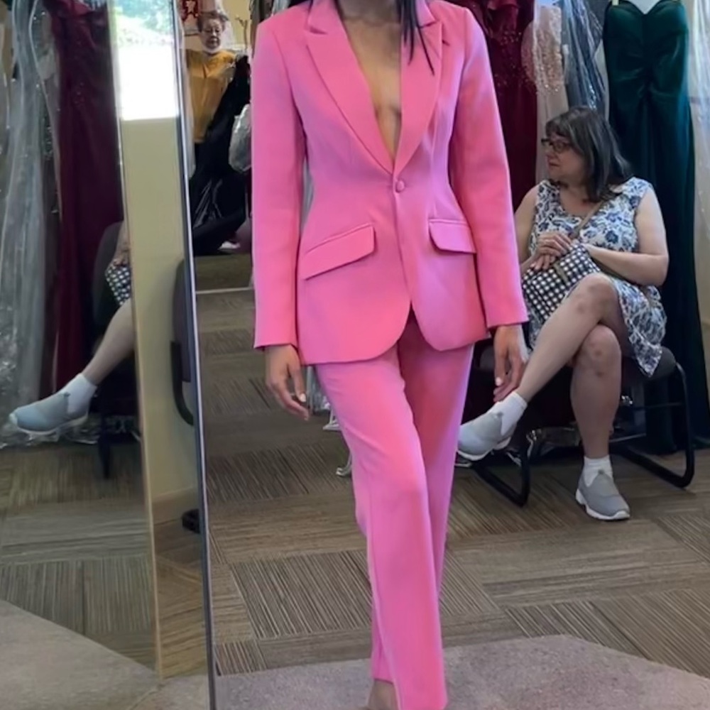 Pink Meshki suit.